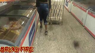 A couple goes shopping in public outdoor area