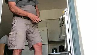 Why is that mature shaved amateur jacking off his cock at the outdoor door?