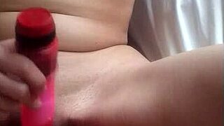 mature girl toys her pussy with anal play