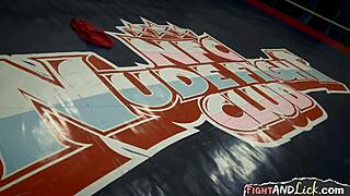 Hot brunette dominates wrestling match, ravages lesbian pussy with strapon fiercely.