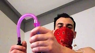 She strokes her big toy alone in stockings with tattoos