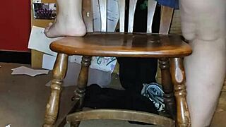 riding a 14 inch dildo in a steamy session with intense pleasure.