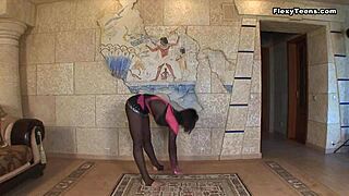 Teen stretches legs showing huge tits acrobatically