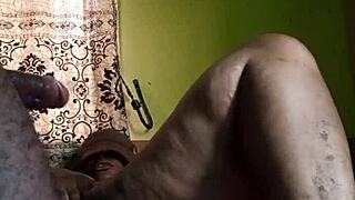 A couple having sex in the dark