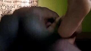 A couple having sex in the dark