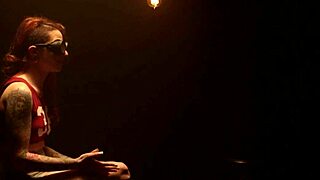 Tattooed redhead tied up, gagged, choked, and whipped hard!