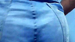 married man dancing in wife's shorts