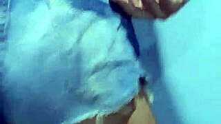 married man dancing in wife's shorts