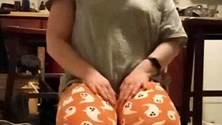 sweaty grey tee clinging during intense workout session