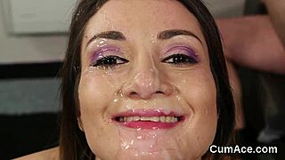 that nasty babe just got a huge cumshot on her face and gulped it all down
