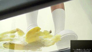 Asian girl crushing banana with feet