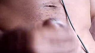 Stroking that big black cock until cum hits the floor, homemade style.