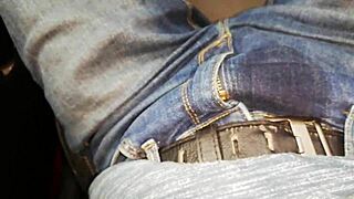 Woman pees inside her car in detailed view