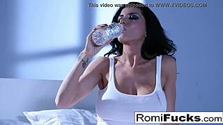 Why Is This Brunette Pornstar Masturbating Her Big Tits on the Bed?