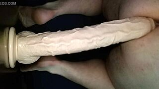 a guy explores a big dildo toy