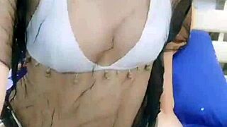 Is this Asian stripper teasing with seductive moves?