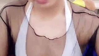 Is this Asian stripper teasing with seductive moves?