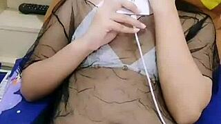 Is this Asian stripper teasing with seductive moves?