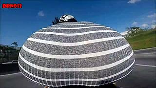 Hot Brunette Shows Ass While Riding Moto