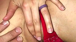 Why is the wife rubbing and fingering her pussy?