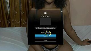 Ebony girl uses dildo on webcam