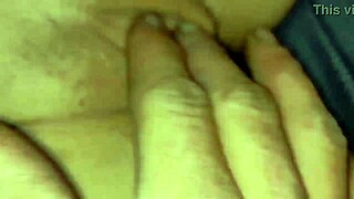 finger fucking her pussy while she masturbates