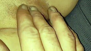 finger fucking her pussy while she masturbates
