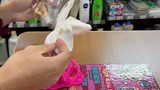 asian ladyboy shows her new thong in the convenience store, so sexy