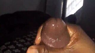 She strokes big black cock to cumshot