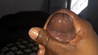 She strokes big black cock to cumshot