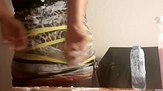 watch this sissy slag get sploshed in clingfilm?