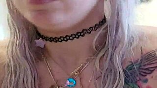 Alina Modelista, tattooed blonde pornstar, masturbates in the jacuzzi