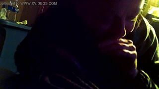 Interracial blowjob video featuring a milf performing oral sex on a large cock in detailed close-up.