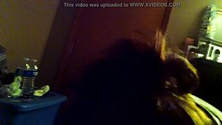 Interracial blowjob video featuring a milf performing oral sex on a large cock in detailed close-up.