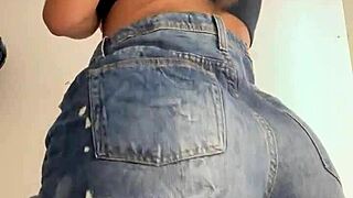 Naughty wife trying on shorts in the mall store with big ass.