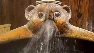 asian girl with raccoon mouth getting bathroom massage