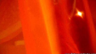 i'm watching this brunette indian girl undress and dance erotically, teasing with striptease.