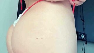 Latina blonde slut flaunts her big ass in a towel at the window 😍