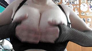 Huge natural tits get oiled up