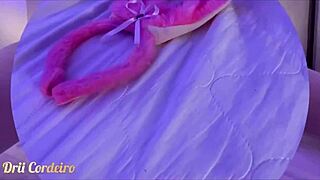 Drii Cordeiro rides in bunny costume.