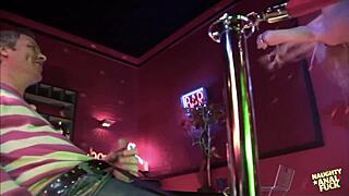 two strippers perform for customers