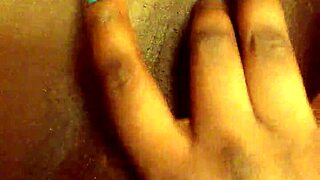 i am playing with my pretty ebony pussy in close up