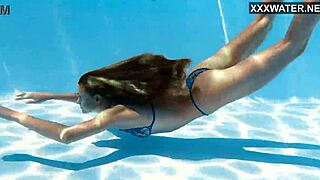 Ivi Rein's petite Russian body shines underwater at the pool