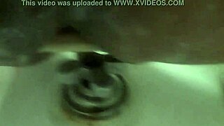 Pounding my toy in the shower for a wild solo session. Can't get enough of that tight grip!