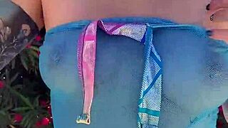 Watch Her Strip And Tease On The Bed Outside!