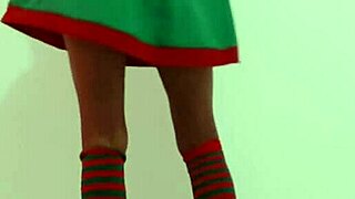 I am celebrating christmas with my christmas suit little by little i am taking off my clothes while i dance sexy on the desk.