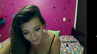 Young voluptuous cam beauty showing off her big tits.
