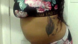 big tit ebony milf shakes her ass while dancing in the bathroom