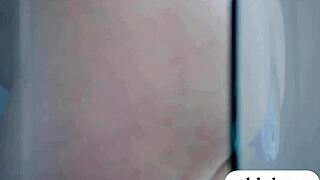 Two attractive babes using a blue dildo together