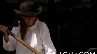 Two girls enjoy playing with a toy.